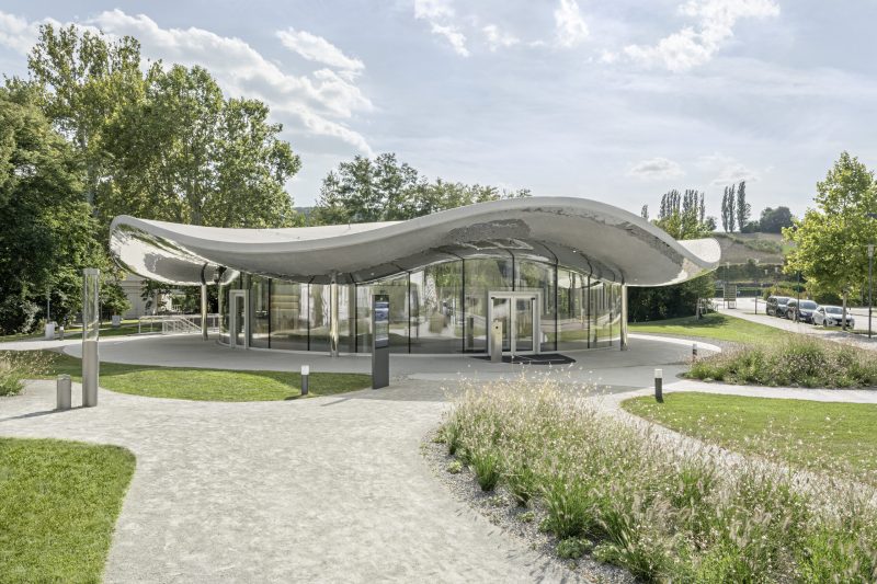 Exterior of the VISTA Science Experience Center on the ISTA campus with its curved reflective roof